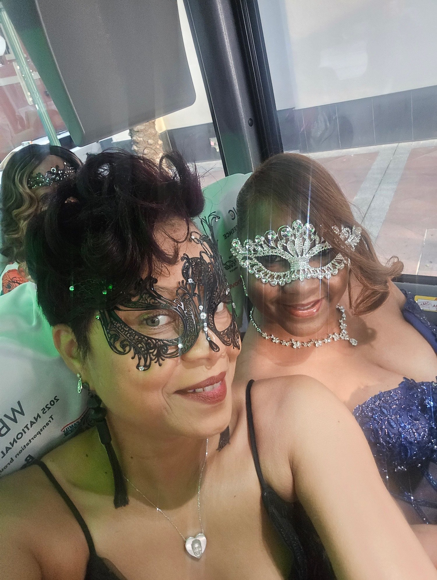 Sherrie and a friend in crystal masquerade masks